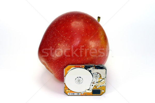Mini HDD 1' near to a red apple Stock photo © vavlt