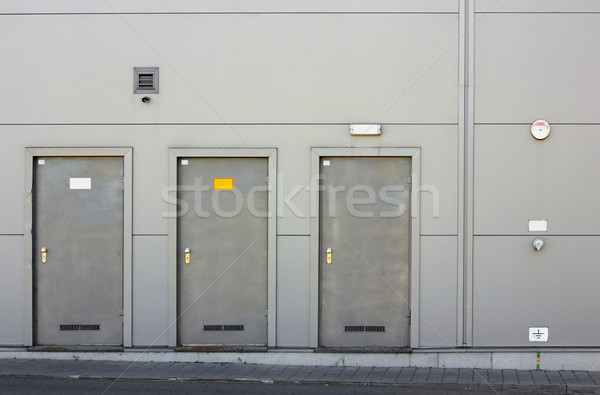 Drei Rüstung Türen grau Metall Wand Stock foto © vavlt