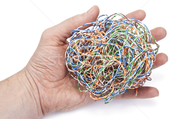 Hand holds ball from a  internet cable   Stock photo © vavlt