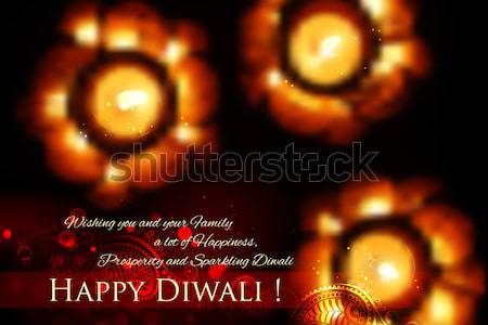Golden lotus shaped diya on abstract Diwali background Stock photo © vectomart