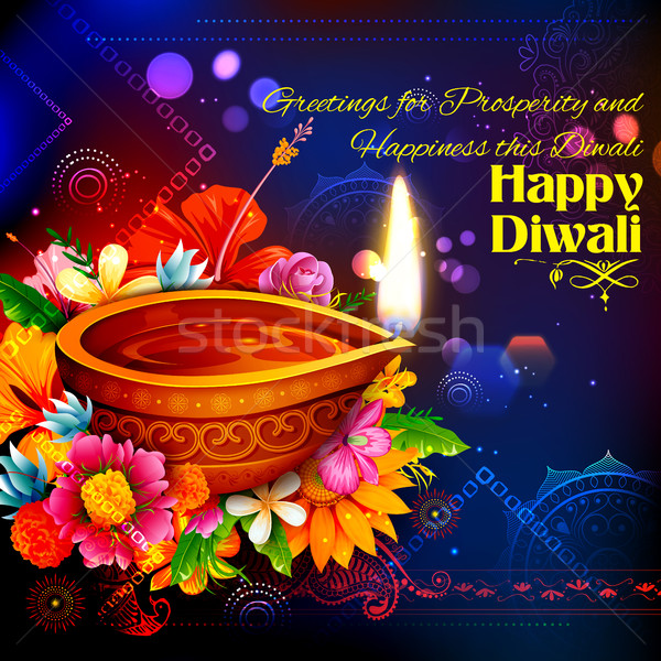 Stock photo: Burning diya on Happy Diwali Holiday background for light festival of India