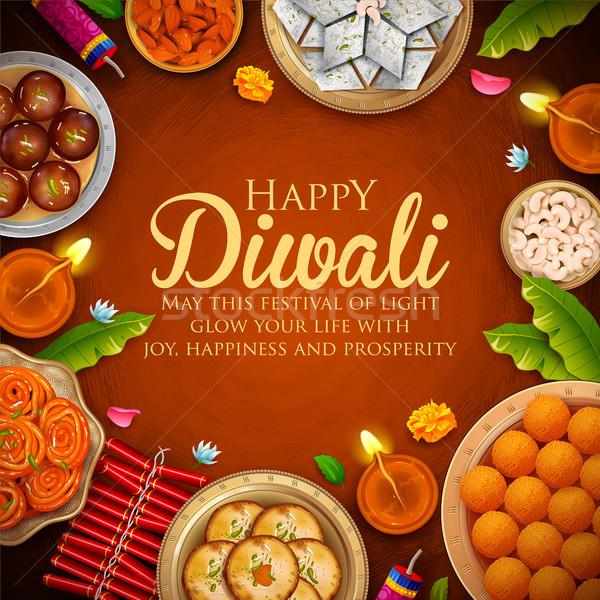 Burning diya with assorted sweet and snack on Happy Diwali Holiday background for light festival of  Stock photo © vectomart