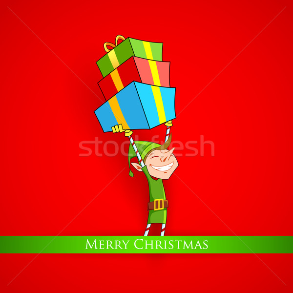 Elf holding Christmas gifts Stock photo © vectomart