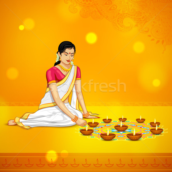 Woman burning diya for Indian festival Diwali Stock photo © vectomart