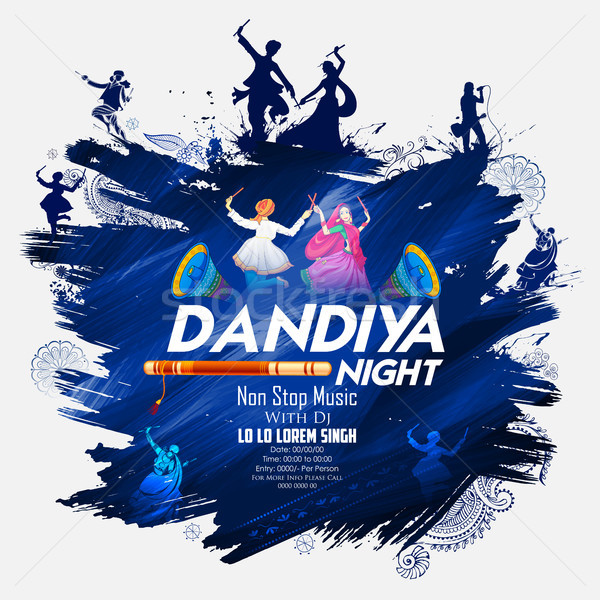 Stock photo: Couple playing Dandiya in disco Garba Night poster for Navratri Dussehra festival of India