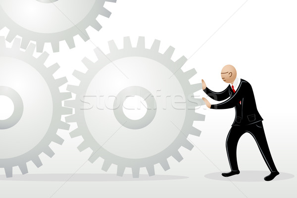 Stock photo: Business Man Pushing Cog Wheel