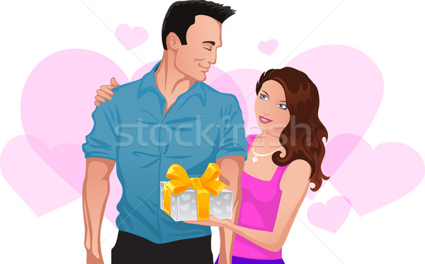 Couple in love. Girl gives a gift to man Stock photo © vectorArta