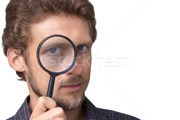 Könyvvizsgálat férfi nagyító szemek orvosi biztonság Stock fotó © velkol
