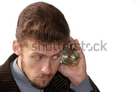 Man listening alarm clock Stock photo © velkol