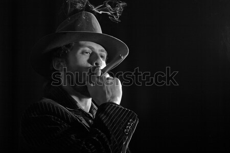 Bearded man with  a cigar Stock photo © velkol