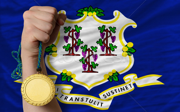 Gold medal for sport and  flag of american state of connecticut  Stock photo © vepar5