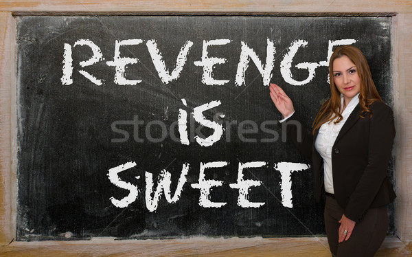 Teacher showing revenge is sweet on blackboard Stock photo © vepar5
