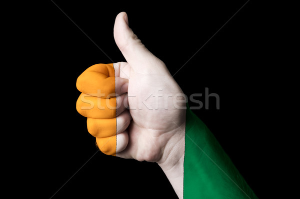 ivory coast national flag thumb up gesture for excellence and ac Stock photo © vepar5