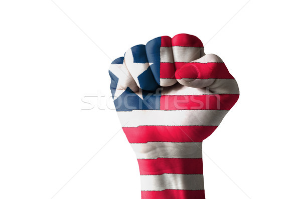 Fist painted in colors of liberia flag Stock photo © vepar5