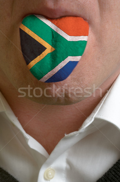 man tongue painted in south africa flag symbolizing to knowledge Stock photo © vepar5
