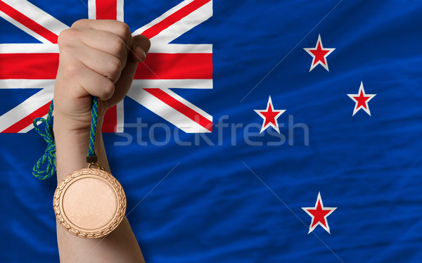 Bronze Medaille Sport Flagge New Zealand halten Stock foto © vepar5