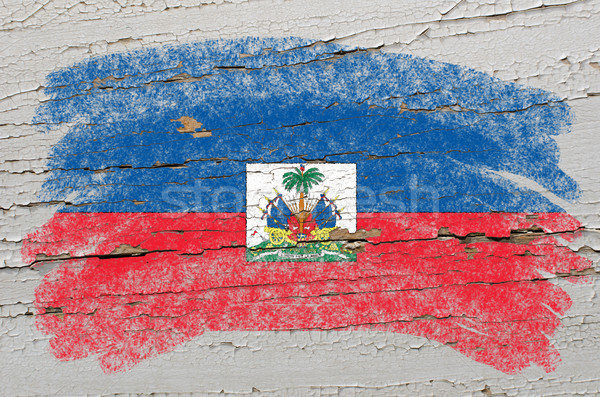 flag of haiti on grunge wooden texture painted with chalk   Stock photo © vepar5