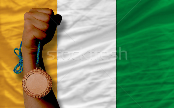 Bronze medal for sport and  national flag of cote ivore    Stock photo © vepar5