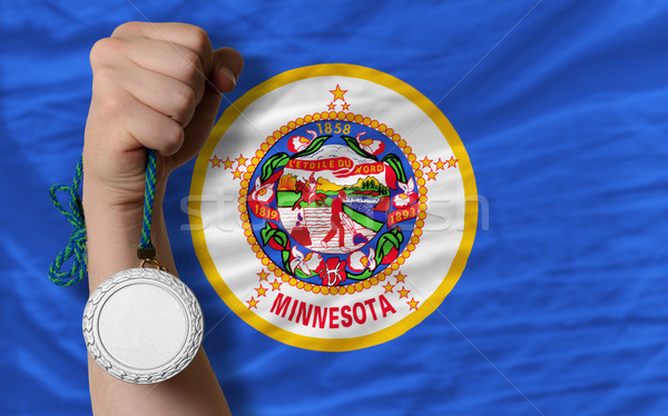 Silver medal for sport and  flag of american state of minnesota  Stock photo © vepar5
