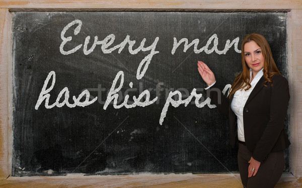 Teacher showing Every man has his price on blackboard Stock photo © vepar5