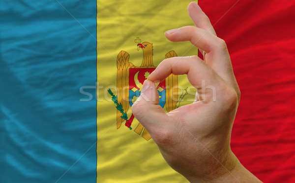 ok gesture in front of moldavia national flag Stock photo © vepar5