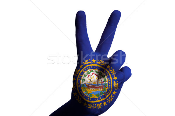 new hampshire us state flag two finger up gesture for victory an Stock photo © vepar5