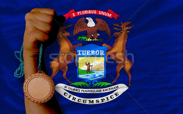 Bronze medal for sport and  flag of american state of michigan   Stock photo © vepar5