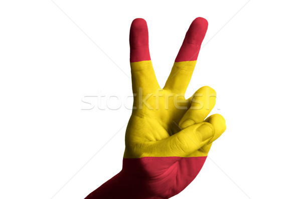 Stock photo: spain national flag two finger up gesture for victory and winner