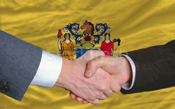 американский флаг Нью-Джерси два бизнесменов рукопожатием Сток-фото © vepar5