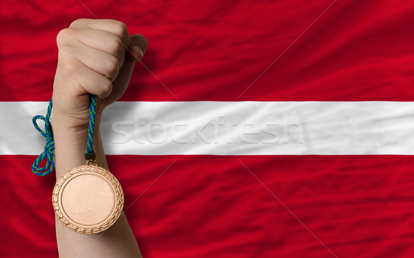 Bronze medal for sport and  national flag of latvia    Stock photo © vepar5