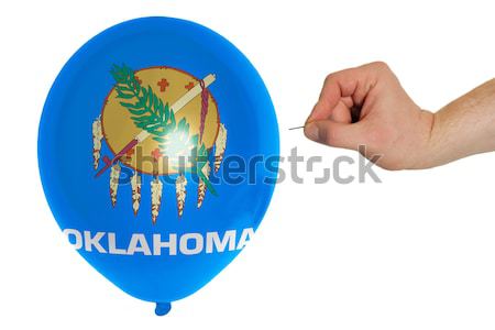 Bursting balloon colored in  flag of american state of new jerse Stock photo © vepar5