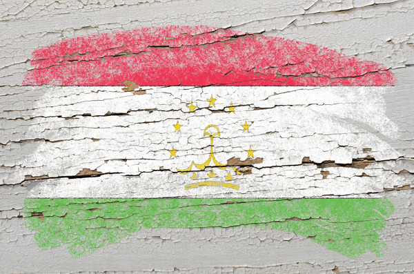 flag of tajikistan on grunge wooden texture painted with chalk   Stock photo © vepar5