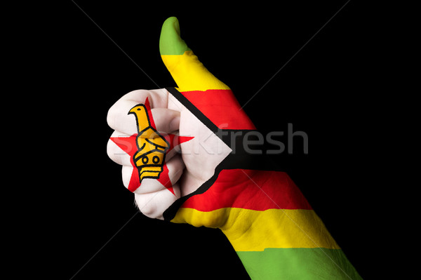 津巴布韋 旗 拇指 上 手勢 卓越 商業照片 © vepar5