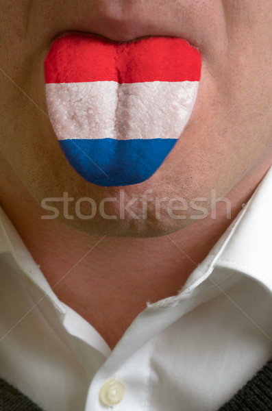 Uomo lingua verniciato Paesi Bassi bandiera conoscenza Foto d'archivio © vepar5