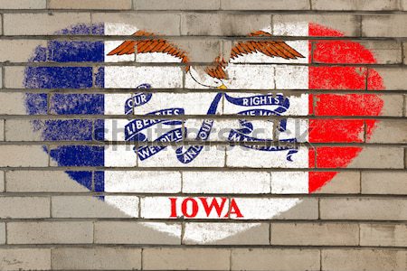 Stock photo: grunge flag of US state of iowa on brick wall painted with chalk