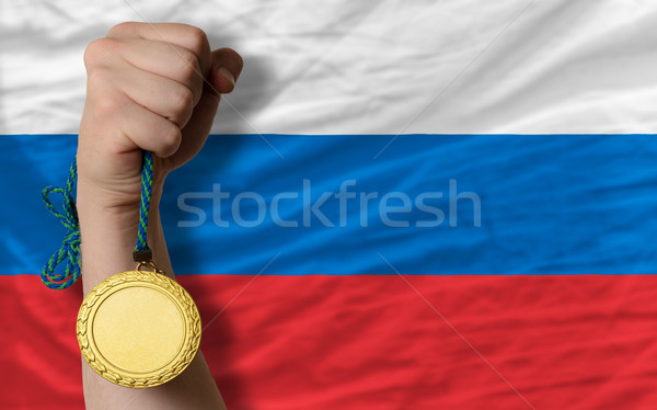 Goldmedaille Sport Flagge Russland Gewinner halten Stock foto © vepar5