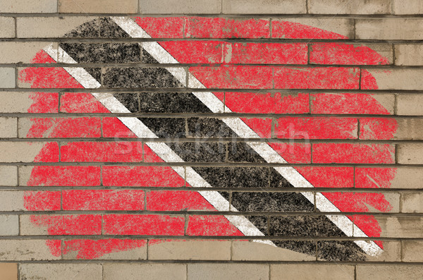 flag of trinidad and tobago on grunge brick wall painted with ch Stock photo © vepar5