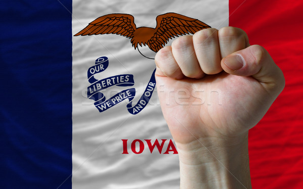 us state flag of iowa with hard fist in front of it symbolizing  Stock photo © vepar5