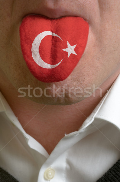 man tongue painted in turkey flag symbolizing to knowledge to sp Stock photo © vepar5