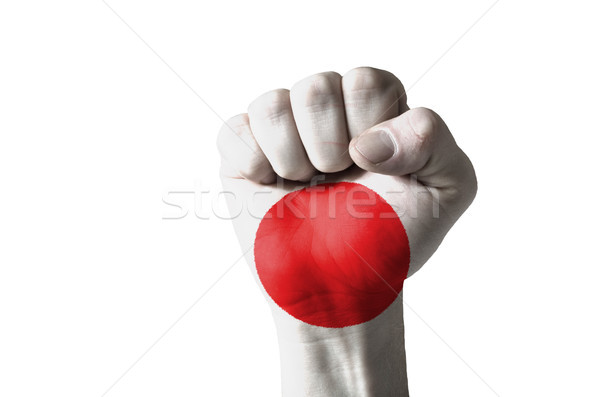 Fist painted in colors of jamaica flag Stock photo © vepar5