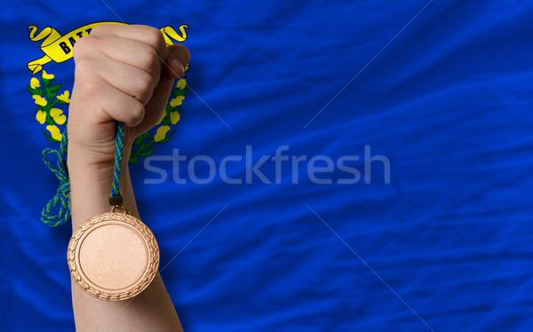 Bronze medal for sport and  flag of american state of nevada    Stock photo © vepar5