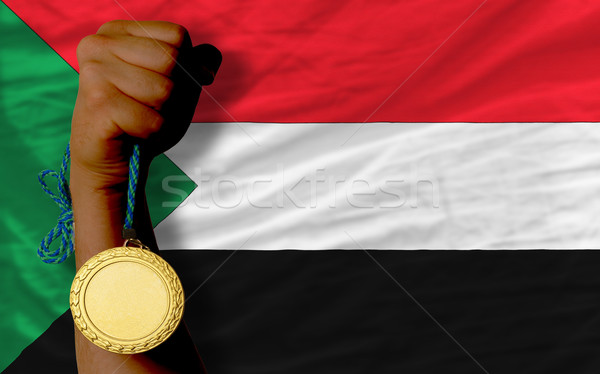 Goldmedaille Sport Flagge Sudan Gewinner halten Stock foto © vepar5