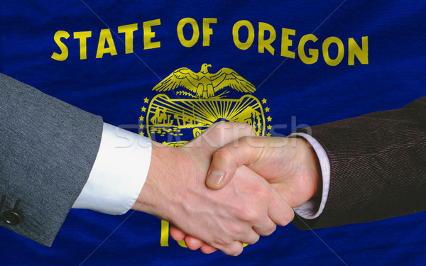 Americano bandeira Oregon dois empresários aperto de mãos Foto stock © vepar5