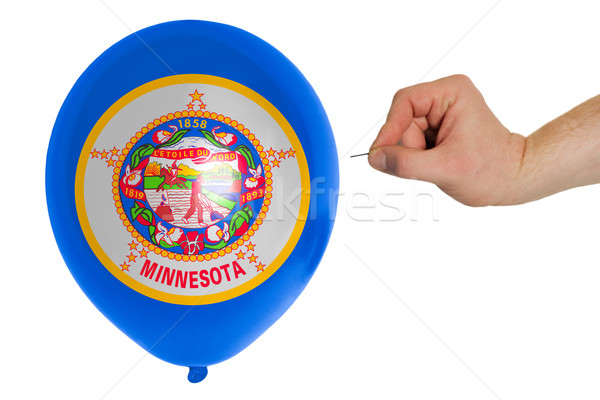 Stock photo: Bursting balloon colored in  flag of american state of minnesota