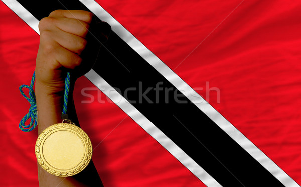 Gold medal for sport and  national flag of trinidad tobago    Stock photo © vepar5