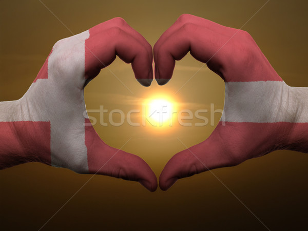 Heart and love gesture by hands colored in denmark flag during b Stock photo © vepar5