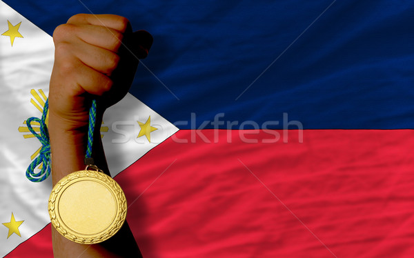 Goldmedaille Sport Flagge Philippinen Gewinner halten Stock foto © vepar5