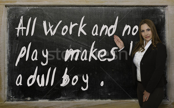 Teacher showing All work and no play makes Jack a dull boy on bl Stock photo © vepar5
