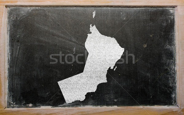 outline map of oman on blackboard  Stock photo © vepar5