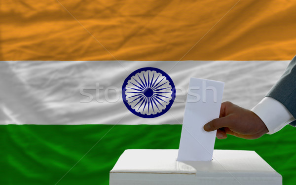 man voting on elections in front of national flag of india Stock photo © vepar5